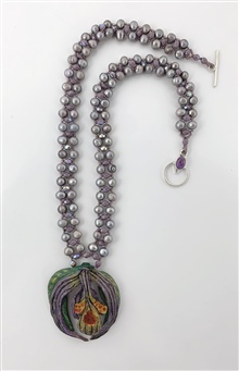 Purple pearls with Tagua Nut flower